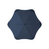 A navy blue BLUNT Classic Umbrella with a unique star shape and a central handle. It features a logo on the design.