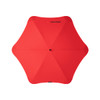 A red BLUNT Exec Umbrella with a smooth, rounded design and a central button, featuring a branding logo.