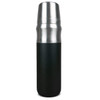 A drink bottle with a silver stainless steel top and a matte black base, featuring a logo.
