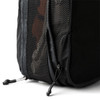 A black packing cube with a mesh side and a zippered opening, showcasing its compact design.