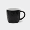 A black ceramic mug with a white interior and a sturdy handle. It has a smooth finish and a logo.