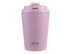 A pink insulated coffee cup with a ceramic lining and a lid, featuring a logo on the front.