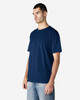 A navy blue Gildan Softstyle adult enzyme wash no label T-shirt displayed on a model, featuring a simple design.