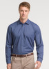 A men's long sleeve shirt in navy blue with a button-down front, paired with beige trousers, featuring a logo.
