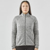 A women's full zip fleece jacket in grey with a high collar and long sleeves, featuring a logo.