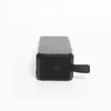 A black rectangular solar speaker featuring controls on one side and a loop for attachment.