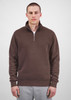 A brown 1/4 zip jumper for men, featuring a collar and ribbed cuffs, displayed on a model.