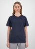 A women's short sleeve tee in navy blue with a relaxed fit, paired with light grey pants. The tee has a logo.