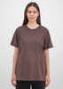 A brown short sleeve women's tee displayed on a model, featuring a simple design and relaxed fit.
