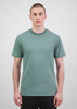 A green short sleeve tee displayed on a male model against a neutral background, featuring a logo.