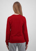 A red women's long sleeve tee viewed from the back, featuring a simple design and a comfortable fit.