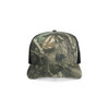 A cap featuring a mesh back with a camouflage design in shades of green and brown. It has a logo on the front.