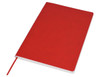 A red A5 notebook with a plain cover and a ribbon bookmark, featuring branding on the front.