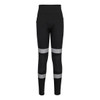 Black leggings featuring reflective strips, designed with a high waistband and pockets. Includes a logo.