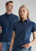 A navy blue men's short sleeve polo shirt displayed on a male and female model, featuring a subtle logo.