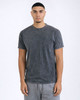 A grey Mineral Wash Adult T-Shirt displayed on a model, featuring a soft texture and classic fit.