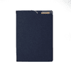 A navy blue A4 notebook with a smooth cover and a logo on the back.