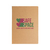 A kraft notebook featuring a logo with hearts and the text "Safe Space Mental Health & Wellness Clinic" in green and pink.