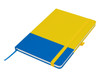 A blue and yellow A5 notebook with a ribbon bookmark and an elastic closure, featuring a logo on the cover.