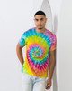 A vibrant tie-dye adult T-shirt featuring swirling colours of pink, yellow, blue, and green, with a logo.