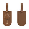 A brown luggage tag with a smooth circular attachment, featuring a subtle design and a loop for securing to luggage.
