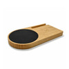 A cup warmer and inductive charger made of bamboo, featuring a black circular heating surface and a slotted design.
