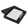 A black gift box containing a white notebook and a silver pen. The set is elegantly presented for gifting.