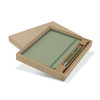 A green notebook and pen set displayed in a kraft gift box. The notebook is closed, and the pen is placed beside it.