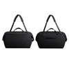 A black duffel bag with dual handles and an adjustable shoulder strap, featuring a logo on the side.