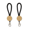A keytag featuring a round wooden element with a black rope attachment and a metal clip.