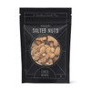 A snack mix bag contains salted nuts, featuring a variety of nuts in a black packaging with a logo.