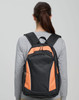 A black and orange backpack with padded shoulder straps and a zippered pocket on the front.