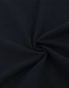 A close-up of navy blue cotton/poly pique fabric, featuring a soft, textured surface.