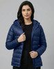 A lightweight hooded puffer jacket in navy blue, featuring a zip front and a branded logo.