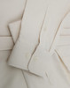 A men's smart casual long-sleeve shirt in a light cream colour, featuring buttoned cuffs and a soft cotton blend fabric.