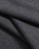 A close-up of soft, dark grey ultrafine cotton pique fabric with visible texture and folds.