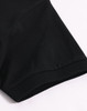 A black ultrafine cotton pique polo shirt with a smooth finish and a logo on the sleeve.