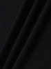 A black ultrafine cotton pique fabric, showcasing a smooth and textured surface. Features a logo or branding.