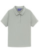 A light grey women's polo shirt with a collared neckline and short sleeves, featuring a logo on the upper part.