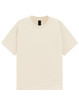 A unisex heavy cotton oversized tee in a cream colour. The shirt features a logo on the label.