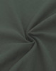 A close-up of a dark green, heavy cotton fabric displaying a smooth texture and subtle sheen.
