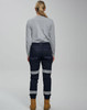 Cotton stretch drill cuffed work pants in navy, featuring reflective tape and a fitted design, viewed from the back.