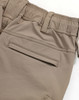 DWR water repellent flexi work pants in light beige with an elastic waistband and side pocket detail.