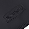 A black leather journal with a textured surface featuring a logo. The design is simple and elegant.
