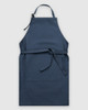 A navy blue apron with a pocket and a tie belt, featuring a simple design and no visible branding.
