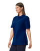 A navy blue polo shirt with short sleeves, featuring a collar and side slits, displayed on a model.