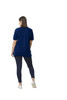 A woman wearing a navy blue polo shirt and dark leggings, viewed from the back. The polo has a logo.