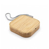 A square wireless charger made of bamboo with a grey fabric cord, featuring a modern design and a logo.