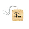 A square bamboo wireless charger with a silver strap and a logo.