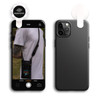 A black smartphone is displayed with an attached LED selfie light. The phone has a photo of a person wearing a bag.